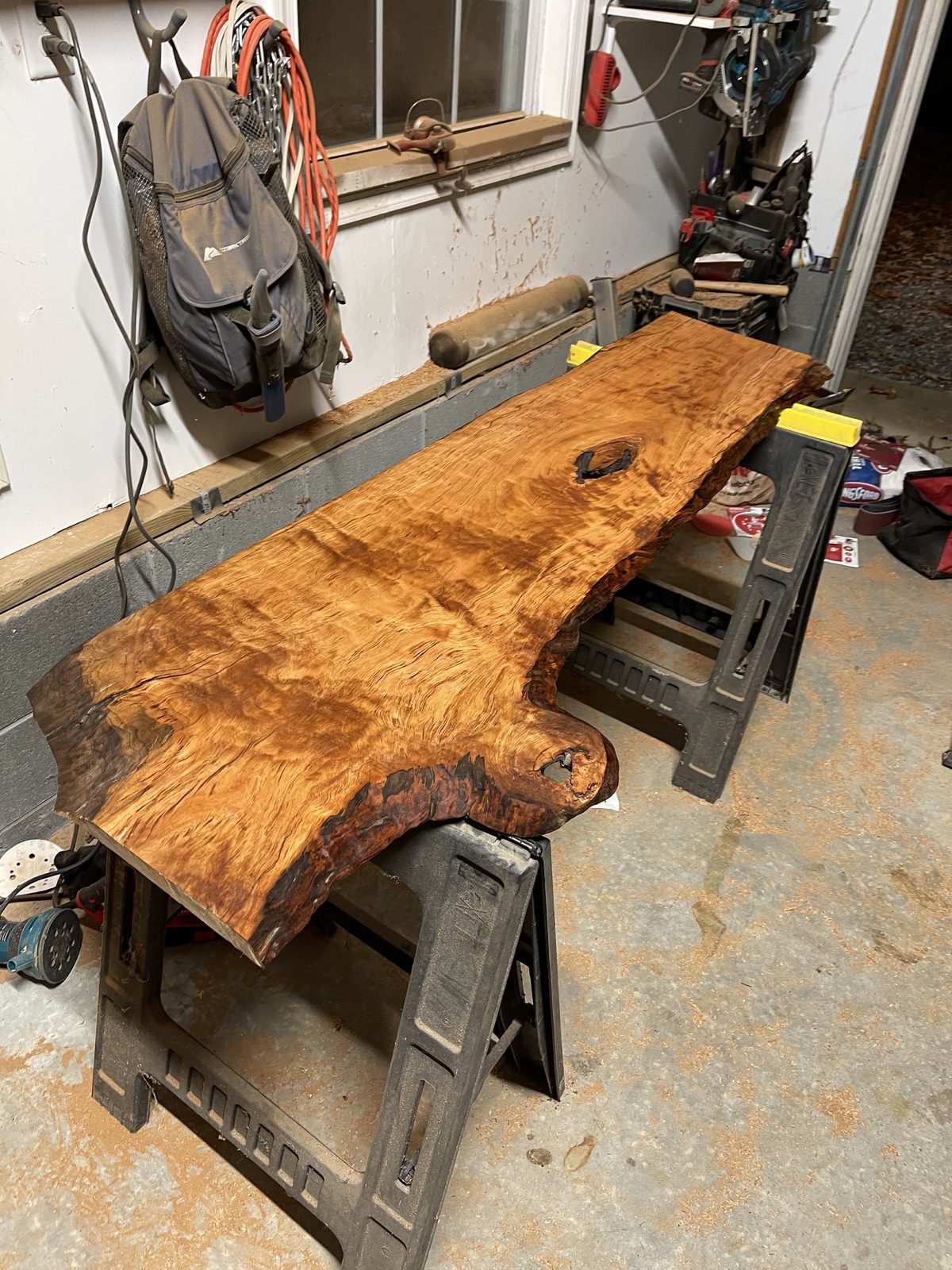 Live-edge slab prep & finishing (custom furniture work).